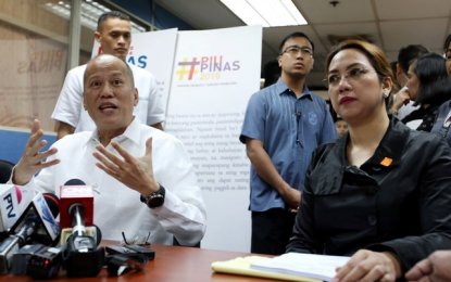 <p><strong>DENGVAXIA FIASCO.</strong> Former President Benigno Aquino III answers a question during a press conference for the investigation of election offense complaints linked to the dengue vaccine program held at the Commission on Elections (Comelec) in Intramuros, Manila City on Thursday (March 15, 2018). Also in the photo is former Health Secretary Janette Garin<em>.</em> <em>(PNA photo by Joey Razon)</em></p>